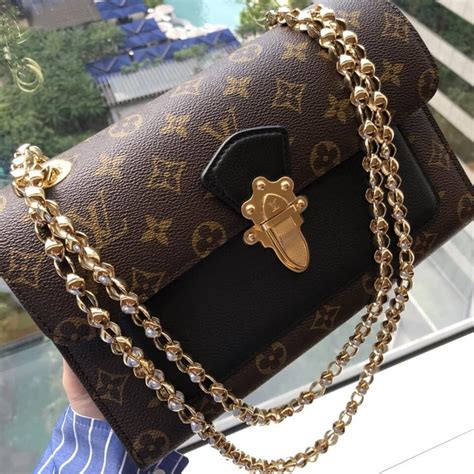 louis vuitton white purse gold chain|louis vuitton black bag price.